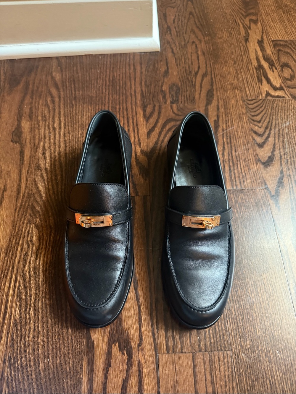 Classic Black Leather Loafers with Gold Accent